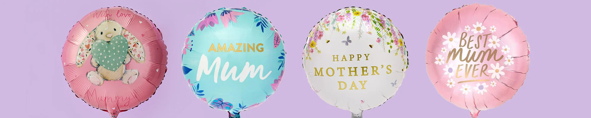 A row of four round foil balloons on a pastel purple background: a pink bunny design with ‘With love Mummy,’ a blue floral balloon with ‘Amazing Mum,’ a white balloon with ‘Happy Mother’s Day,’ and a pink daisy‑themed balloon reading ‘Best Mum Ever.’