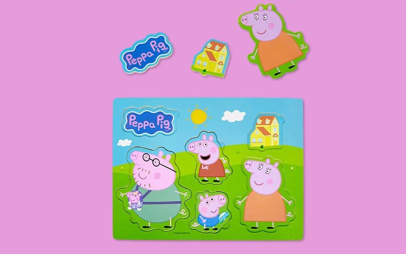 A Peppa Pig wooden puzzle on a pink background, featuring Peppa Pig family characters and removable pieces, with additional character pieces displayed above the board.