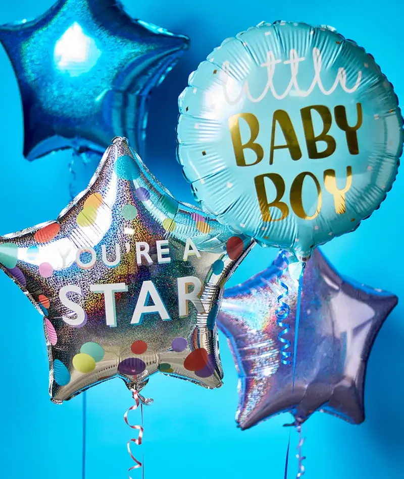 Blue baby boy celebration balloons, including star-shaped designs and a round balloon with a baby shower message, displayed against a blue background. Blue baby boy celebration balloons, including star-shaped designs and a round balloon with a baby shower message, displayed against a blue background.