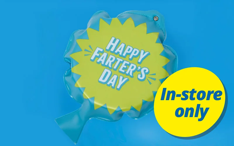 A teal inflatable novelty cushion with a bright yellow starburst design printed with the text ‘Happy Farter’s Day,’ displayed against a blue background. A teal inflatable novelty cushion with a bright yellow starburst design printed with the text ‘Happy Farter’s Day,’ displayed against a blue background.