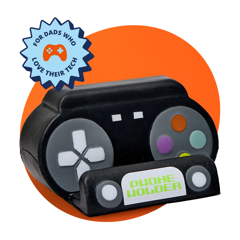 A golf‑themed gift set featuring a white mug printed with ‘Tee Time!’ and a smiling golf ball illustration, paired with grey socks patterned with golf clubs and tees, presented with green tags reading ‘For a par‑fect guy’ and ‘Just your cup of tee,’ displayed against a bright blue background with a ‘For dads who love the fairway’ badge. A golf‑themed gift set featuring a white mug printed with ‘Tee Time!’ and a smiling golf ball illustration, paired with grey socks patterned with golf clubs and tees, presented with green tags reading ‘For a par‑fect guy’ and ‘Just your cup of tee,’ displayed against a bright blue background with a ‘For dads who love the fairway’ badge.