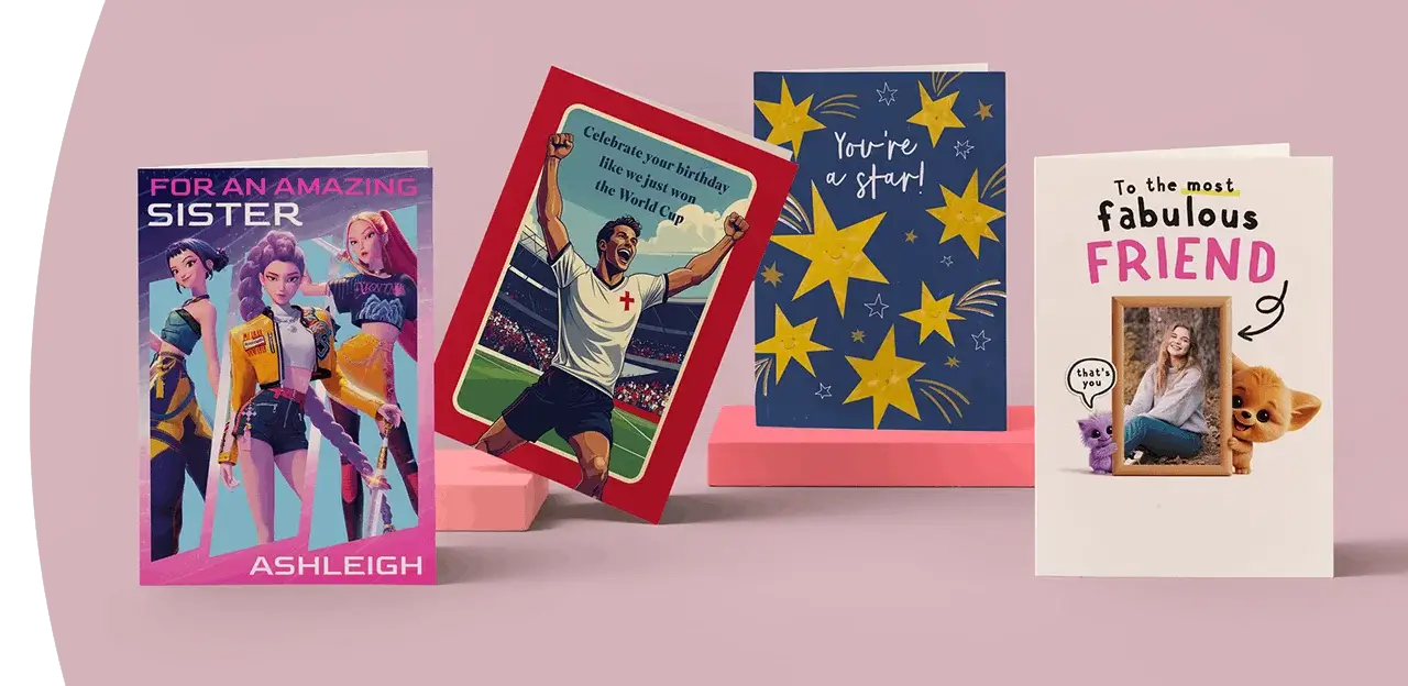 Selection of greeting cards including personalised sister, football-themed birthday, star design, and photo friend cards displayed on a green background.