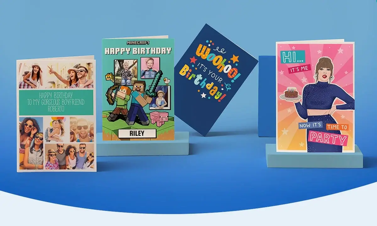 Four birthday cards on a blue background: a photo collage card saying 'Happy Birthday to my gorgeous boyfriend Roberto', a Minecraft-themed card with 'Minecraft Happy Birthday Riley', a dark blue card with 'Woohoo! It's your Birthday!', and a card with a person holding a cake saying 'Hi... it's me. Now it's time to party