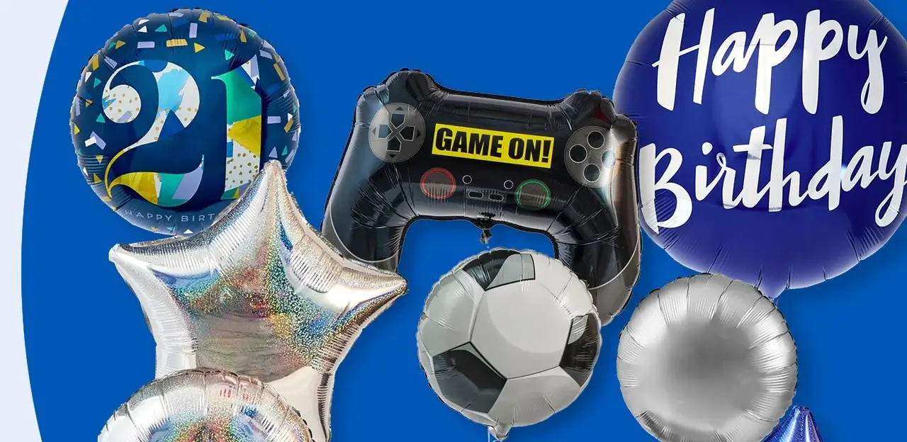 A collection of seven balloons against a blue background. Designs include a round balloon with the number 21 and 'HAPPY BIRTHDAY', a silver star-shaped balloon, a soccer ball balloon, a silver round balloon, a game controller balloon with 'GAME ON!', a blue balloon with 'Happy Birthday', and another silver star balloon.