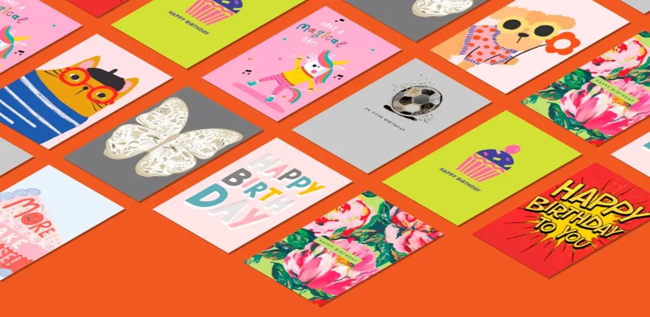 A collection of colorful greeting cards arranged on an orange background. The cards feature various designs, including a soccer ball, a bear with sunglasses, flowers, and birthday messages such as 'HAPPY BIRTHDAY', 'HAPPY BIRTHDAY TO YOU', and 'MORE CAKE PLEASE