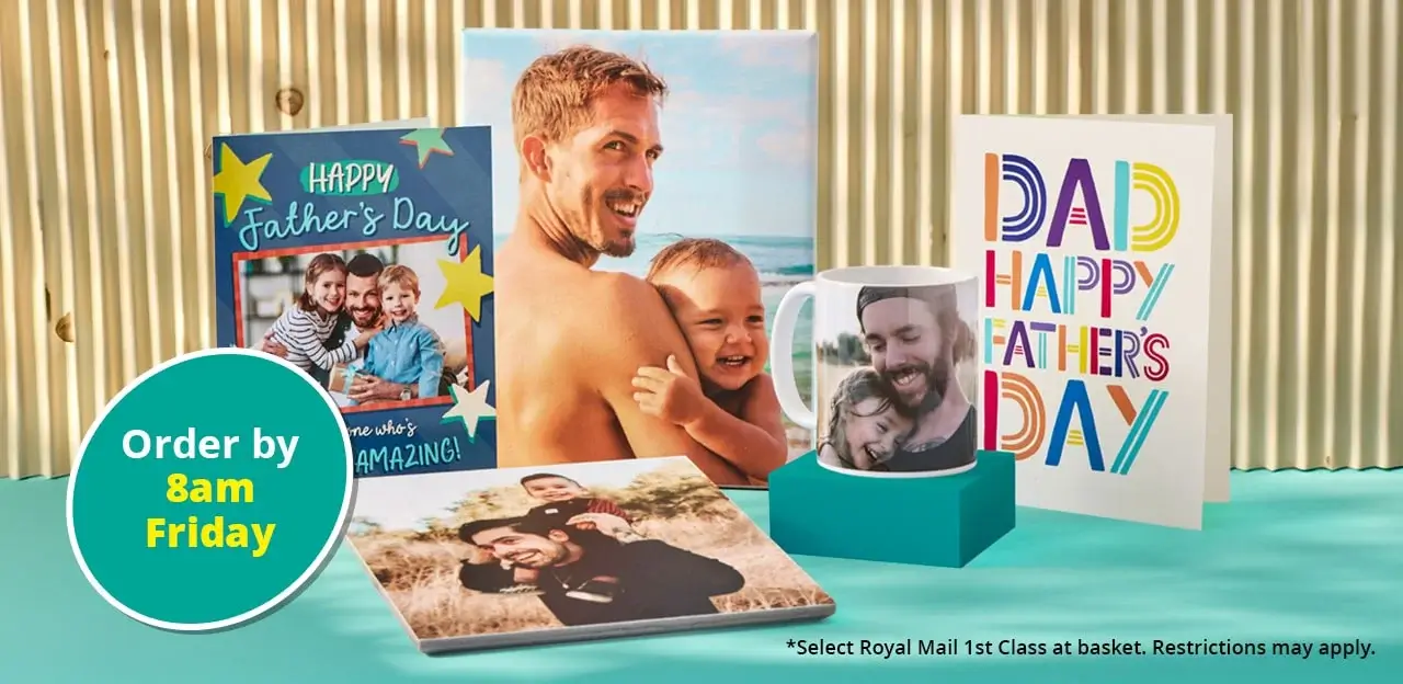 A display of Father's Day gifts including personalised photo cards, a mug with a child's photo, and a photo book. The background features a corrugated surface and the text 'Order by 4pm Thursday' in a green circle. There is also small text at the bottom right corner that reads 'Select Royal Mail 1st Class at basket. Restrictions may apply.