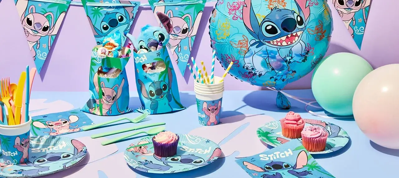 The image shows a themed party setup featuring the character Stitch from Disney's 