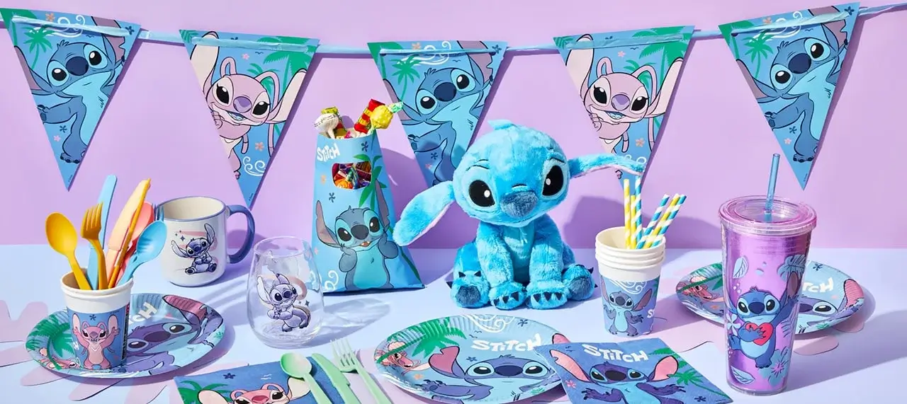 The image shows a themed party setup featuring the character Stitch from Disney's 