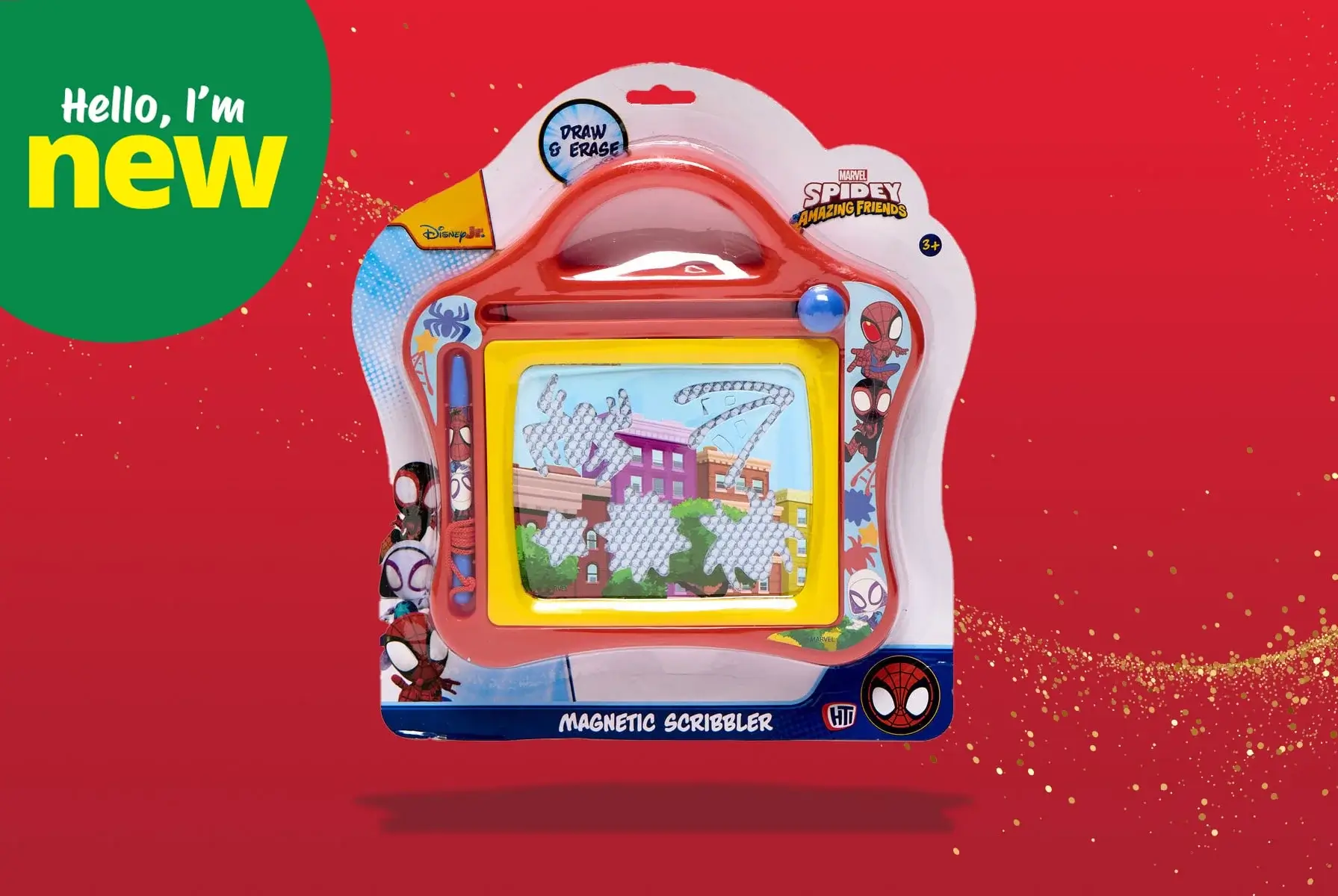 Marvel Spidey and Friends magnetic scribbler toy in colorful packaging with a red handle, displayed against a bright red background with a green “Hello, I’m new” label.