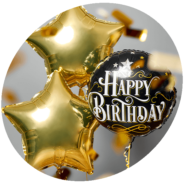 Birthday balloon bouquet featuring a Happy Birthday confetti balloon and two gold star-shaped foil balloons.