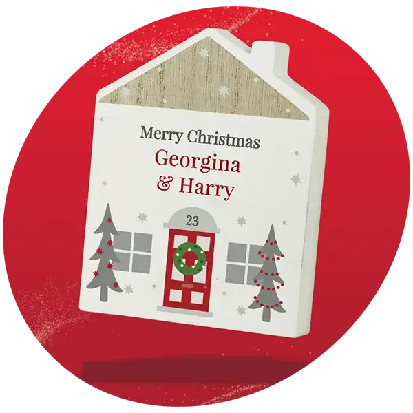 Festive wooden house decoration with red door, Christmas wreath, number 23, and Merry Christmas Georgina and Harry text, surrounded by stars and trees on a red background. Festive wooden house decoration with red door, Christmas wreath, number 23, and Merry Christmas Georgina and Harry text, surrounded by stars and trees on a red background.