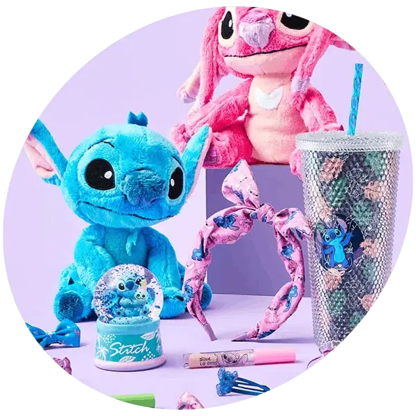 Disney Stitch themed collection with plush toys, headband, tumbler, snow globe, and stationery on a pastel background