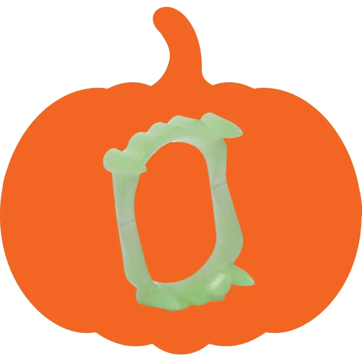 Green plastic vampire teeth toy placed in the center of an orange pumpkin silhouette.