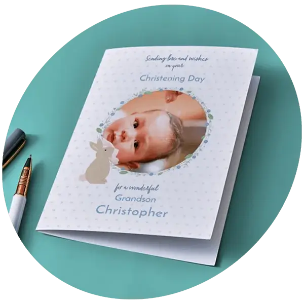 Personalised christening card featuring a baby photo, floral border details, and a special Christening Day message.