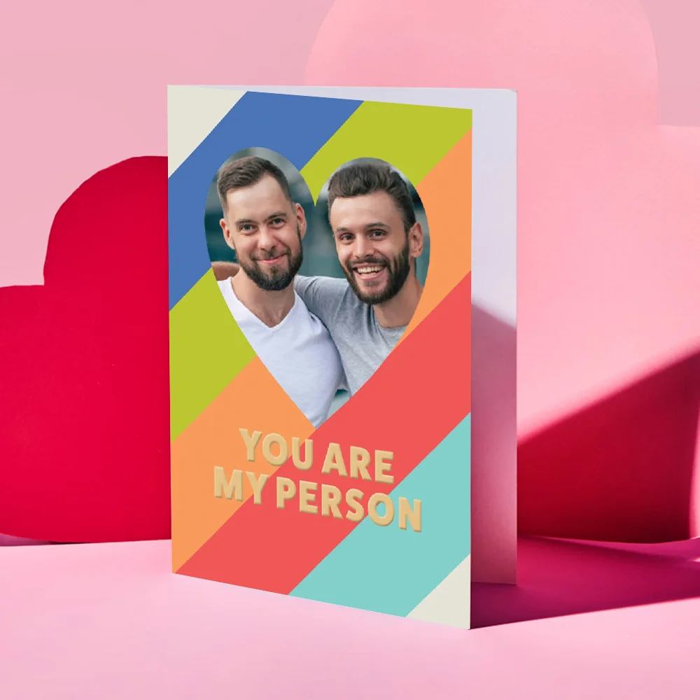 Valentine’s Day card featuring a collage of four romantic couple photos outdoors, decorated with red and gold hearts and the text “Your message here” and “Happy Valentine’s Day” in elegant script