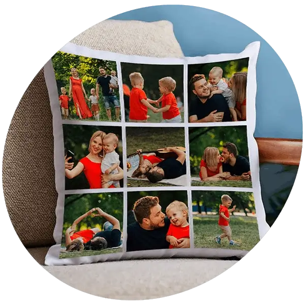 A white photo collage cushion with nine family photos displayed on a beige sofa in a cozy living room setting.