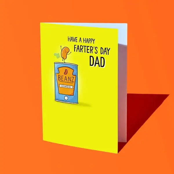 Bright yellow Fathers Day card on an orange background featuring a cartoon bean tin and the message Have a happy farters day dad