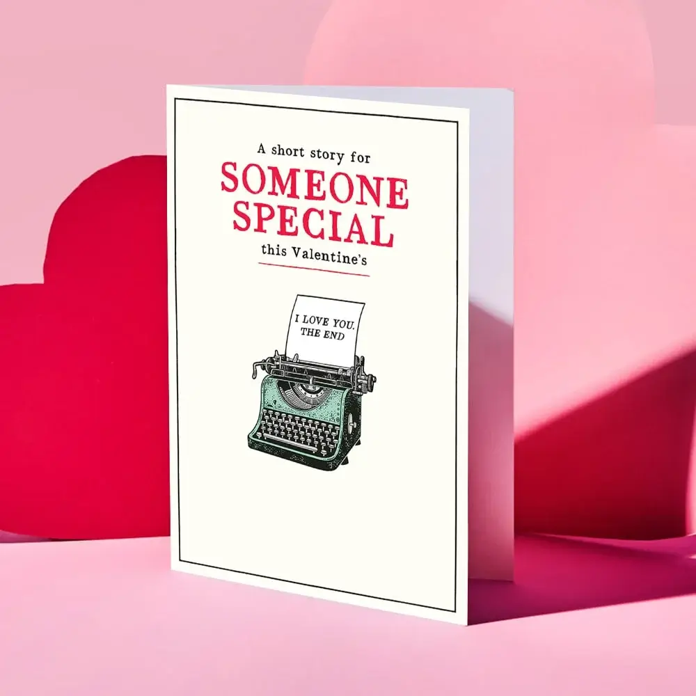 Valentine’s Day card featuring a collage of four romantic couple photos outdoors, decorated with red and gold hearts and the text “Your message here” and “Happy Valentine’s Day” in elegant script