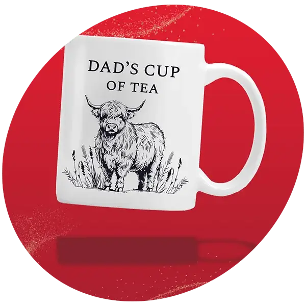 White ceramic mug with black text that reads Dad’s Cup of Tea and an illustration of a Highland cow, set against a bright red background.