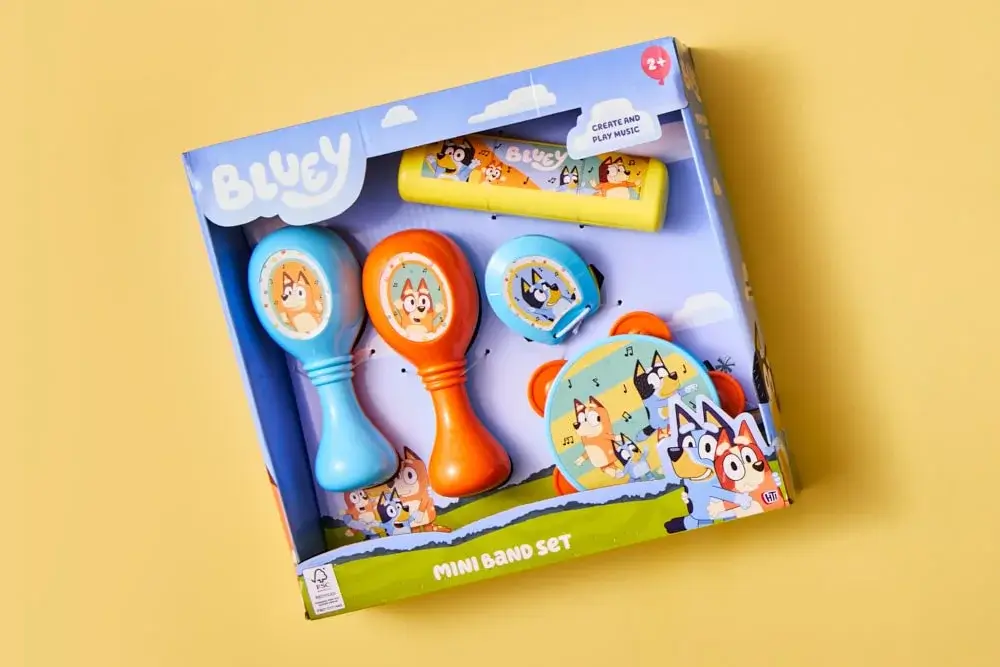 Boxed Bluey Mini Band Set for children with maracas, harmonica, tambourine, and castanet featuring Bluey characters. Boxed Bluey Mini Band Set for children with maracas, harmonica, tambourine, and castanet featuring Bluey characters.